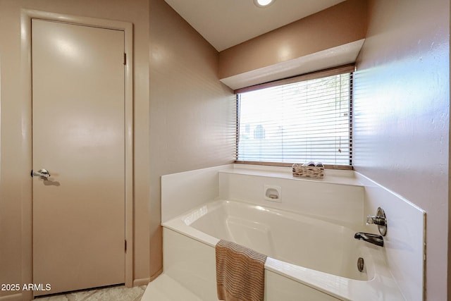 full bathroom with a garden tub