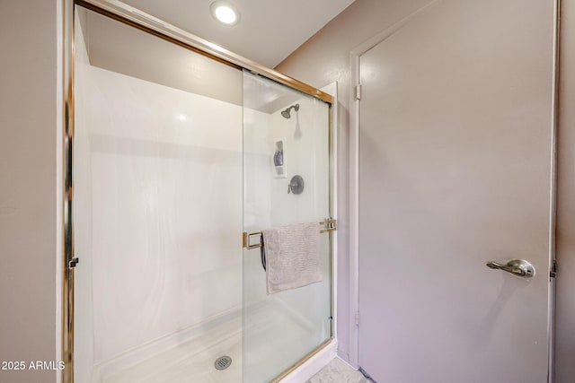 bathroom with a stall shower