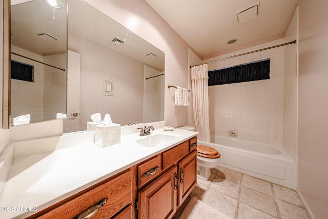 full bath with vanity, shower / tub combo, toilet, and visible vents