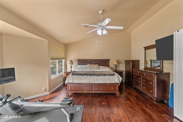 bedroom with vaulted ceiling, ceiling fan, dark wood-type flooring, and baseboards