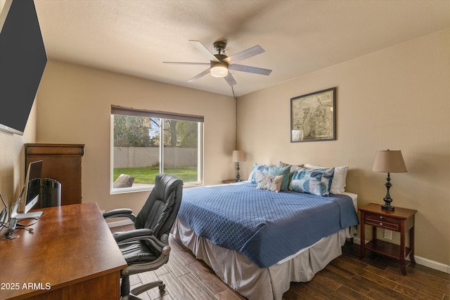 bedroom featuring wood tiled floor, baseboards, and a ceiling fan