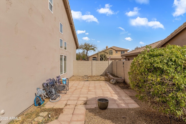 view of patio featuring a fenced backyard