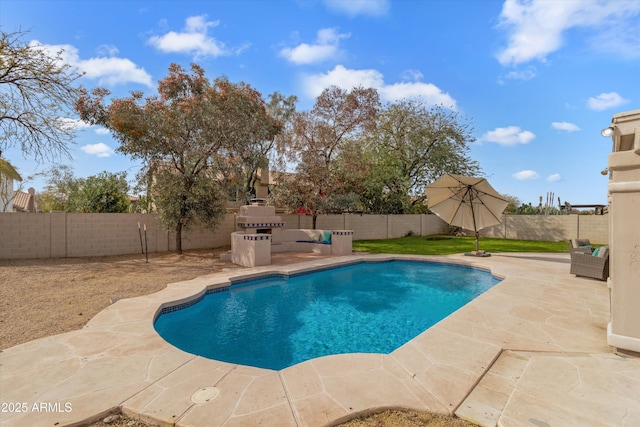 view of pool with a patio area, a fenced backyard, and a fenced in pool