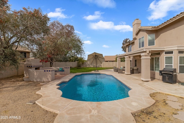 view of pool with a fenced backyard, area for grilling, an outdoor living space, a fenced in pool, and a patio area