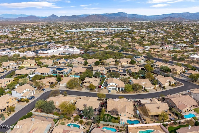 bird's eye view with a residential view and a mountain view