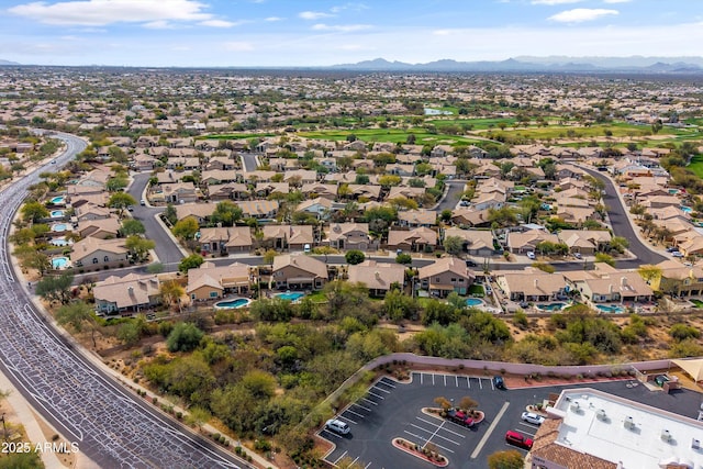 bird's eye view featuring a residential view and a mountain view