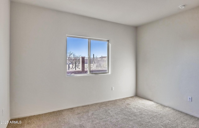 empty room featuring carpet flooring