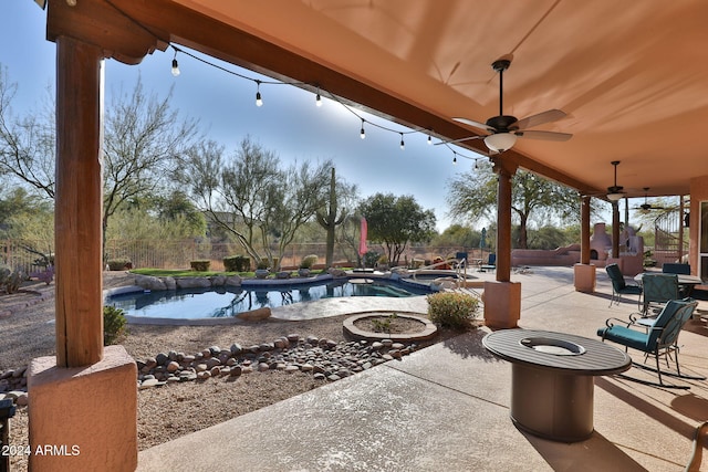 view of patio featuring ceiling fan