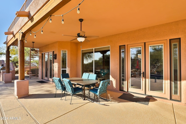 view of patio featuring ceiling fan