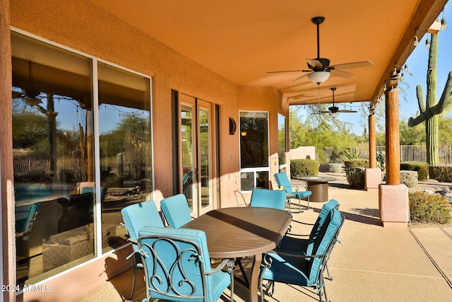 view of patio featuring ceiling fan