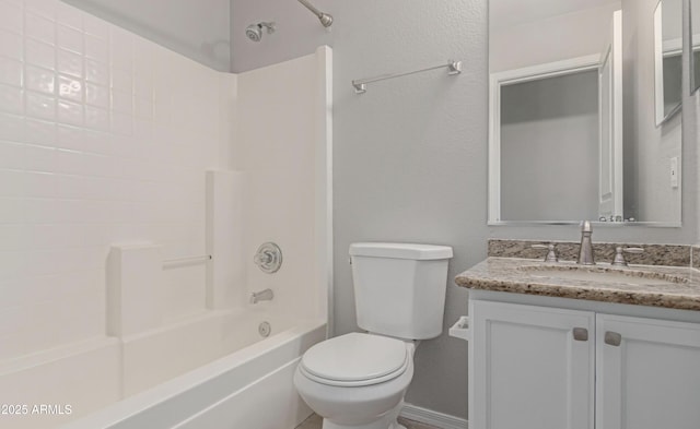 full bathroom featuring vanity, washtub / shower combination, and toilet