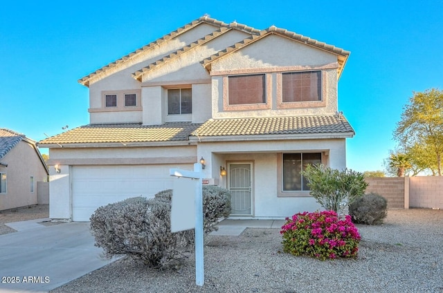 view of front of property featuring a garage