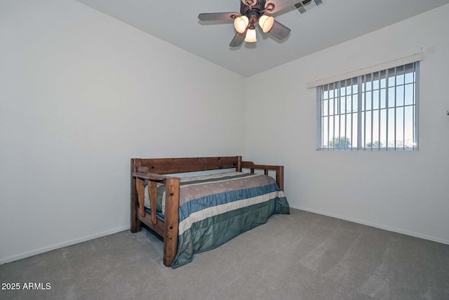 bedroom with ceiling fan and carpet flooring