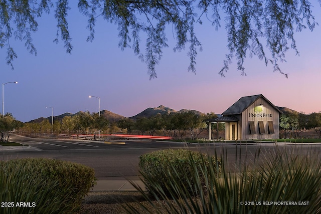 exterior space featuring a mountain view