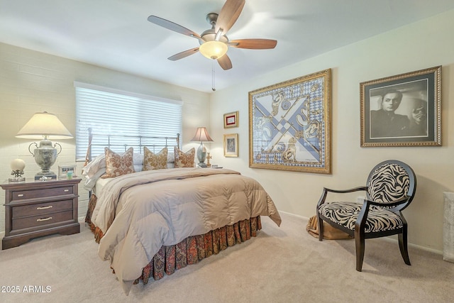 carpeted bedroom featuring a ceiling fan and baseboards