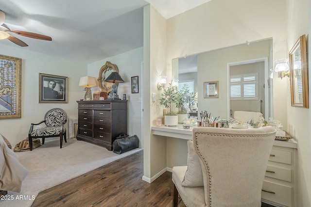 bathroom featuring ceiling fan, baseboards, and wood finished floors