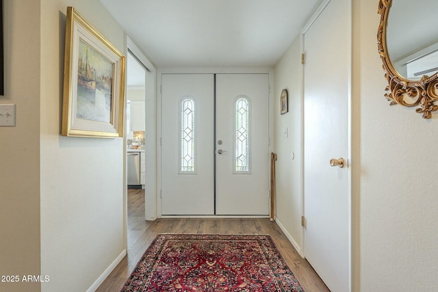 foyer with light wood-style flooring