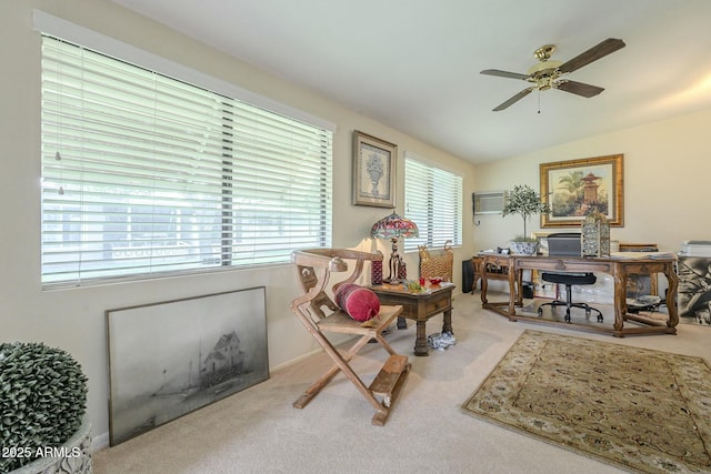 home office featuring ceiling fan, carpet, and vaulted ceiling