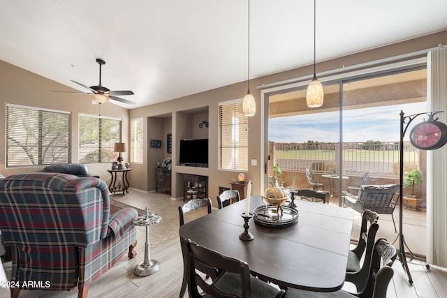 dining area featuring ceiling fan and light hardwood / wood-style flooring