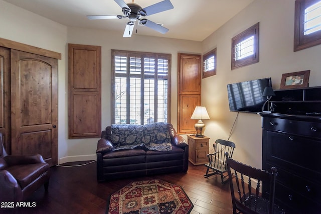 35195 N 98th St Unit 85, Scottsdale, AZ 85262 - living area featuring dark wood-style floors, a ceiling fan, and baseboards