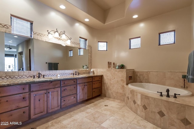 35195 N 98th St Unit 85, Scottsdale, AZ 85262 - full bathroom with double vanity, a garden tub, tile patterned floors, recessed lighting, and a ceiling fan