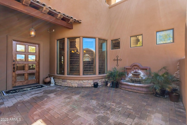 35195 N 98th St Unit 85, Scottsdale, AZ 85262 - view of exterior entry featuring stucco siding and stone siding