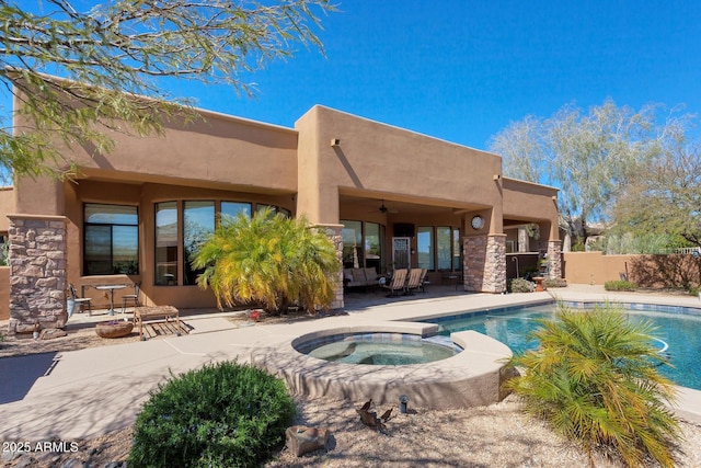 35195 N 98th St Unit 85, Scottsdale, AZ 85262 - view of swimming pool featuring a patio area, a ceiling fan, and a pool with connected hot tub