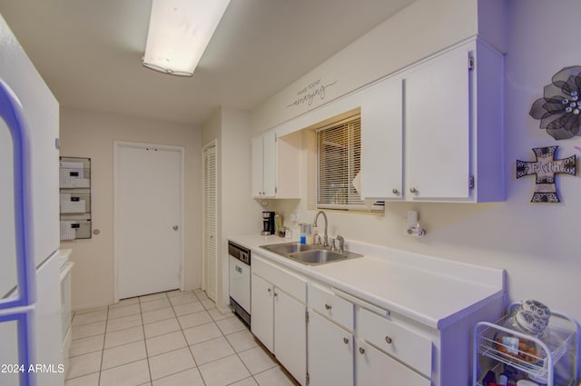 kitchen with white dishwasher, sink, and white cabinets