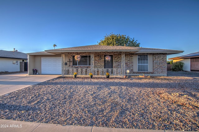 single story home with a garage