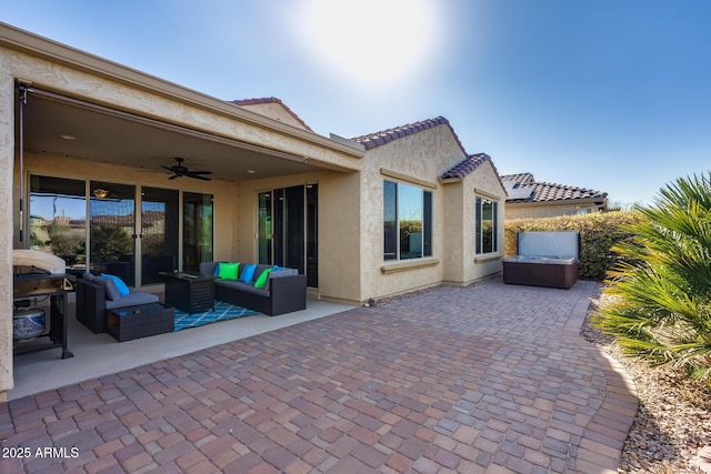 view of patio / terrace featuring ceiling fan and an outdoor hangout area