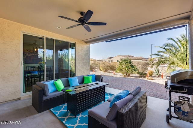 view of patio / terrace with ceiling fan, an outdoor living space, and area for grilling