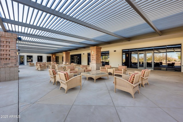 view of patio / terrace with an outdoor living space and a pergola