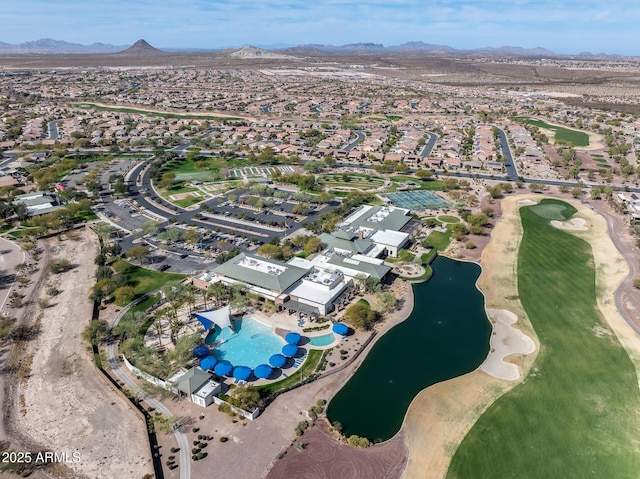 bird's eye view with a water and mountain view