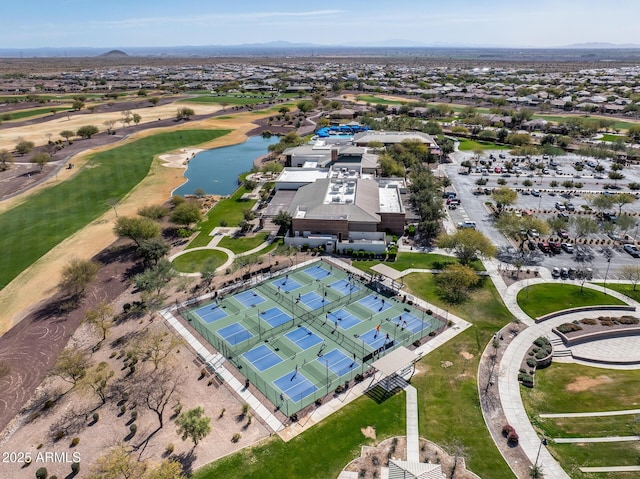 birds eye view of property featuring a water view