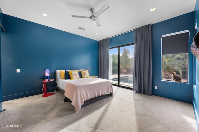 bedroom with access to outside and ceiling fan