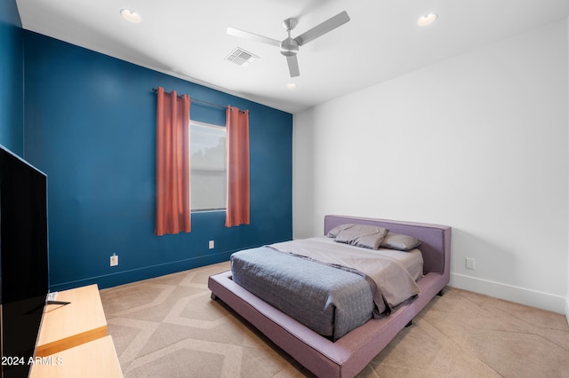 carpeted bedroom with ceiling fan