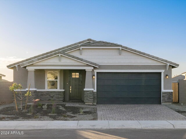 craftsman-style house with a garage