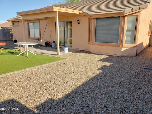 rear view of property with a patio