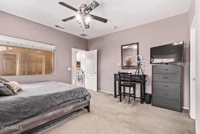 bedroom with carpet floors, baseboards, and visible vents