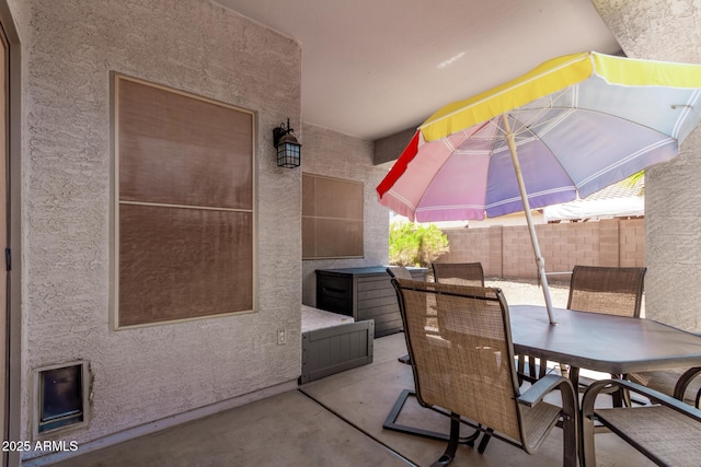 view of patio / terrace with fence and outdoor dining space