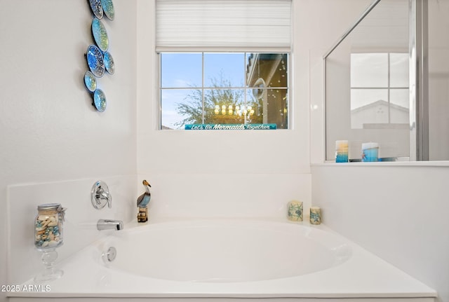 bathroom featuring a garden tub