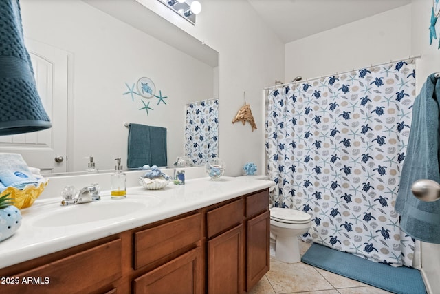 full bath featuring a shower with shower curtain, vanity, toilet, and tile patterned floors