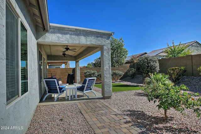 view of patio / terrace with ceiling fan