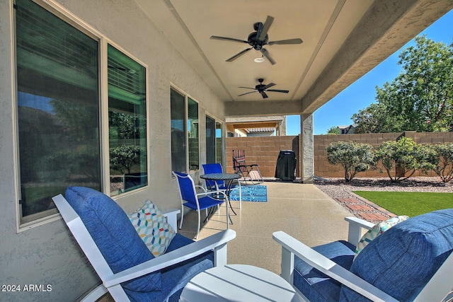 view of patio with ceiling fan