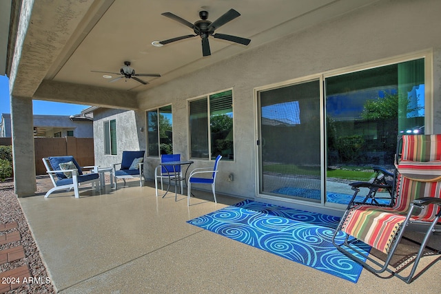 view of patio with ceiling fan