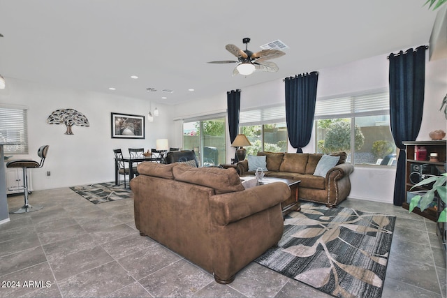 living room featuring ceiling fan