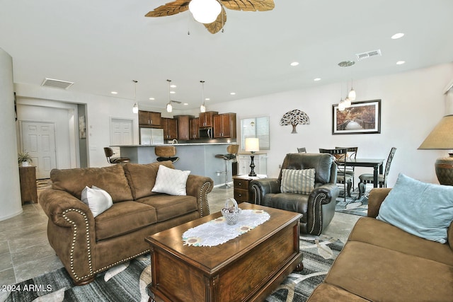 living room with ceiling fan