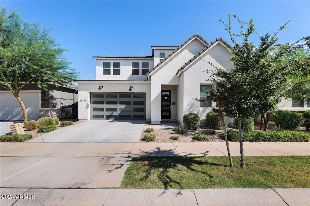 view of front of home with a garage