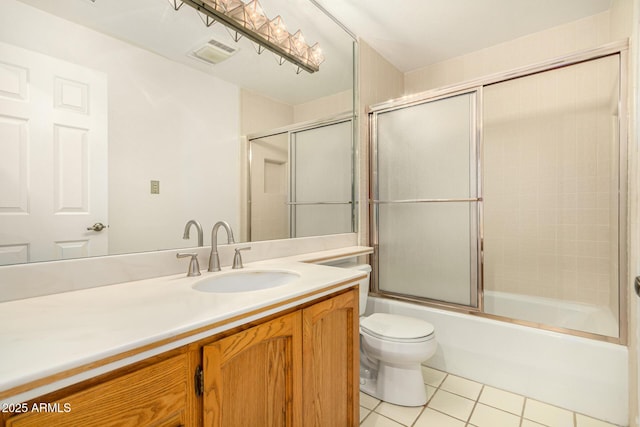 5200 S Lakeshore Dr Unit 206, Tempe, AZ 85283 - full bathroom featuring tile patterned floors, toilet, vanity, and bath / shower combo with glass door
