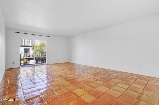 view of tiled spare room